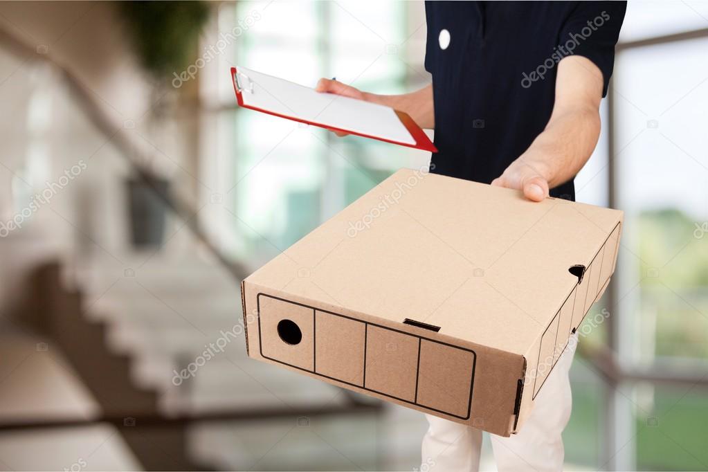 Man Delivering Package To client