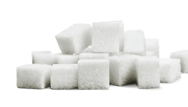Cubos de azúcar sobre fondo —  Fotos de Stock