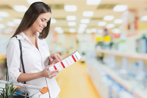 Woman with cart shopping — Stock Photo, Image