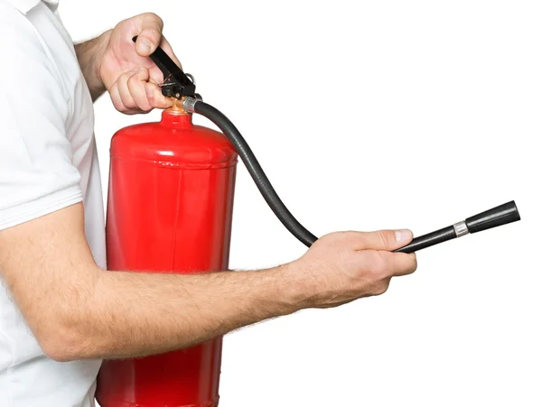 Mano presiona el disparador extintor — Foto de Stock