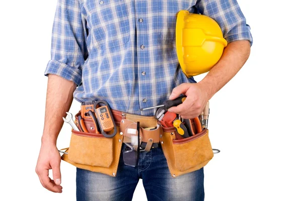 Manliga arbetare med verktygsbälte — Stockfoto
