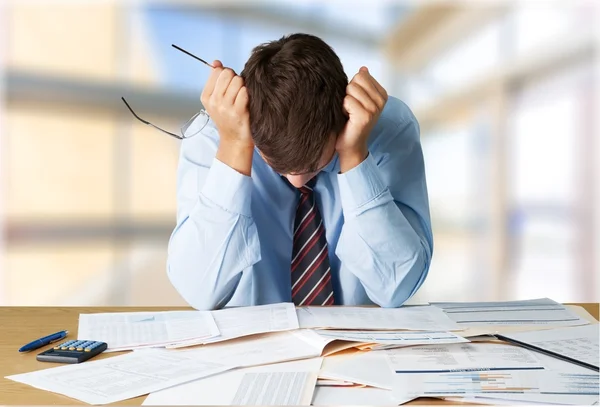 Tired young businessman — Stock Photo, Image