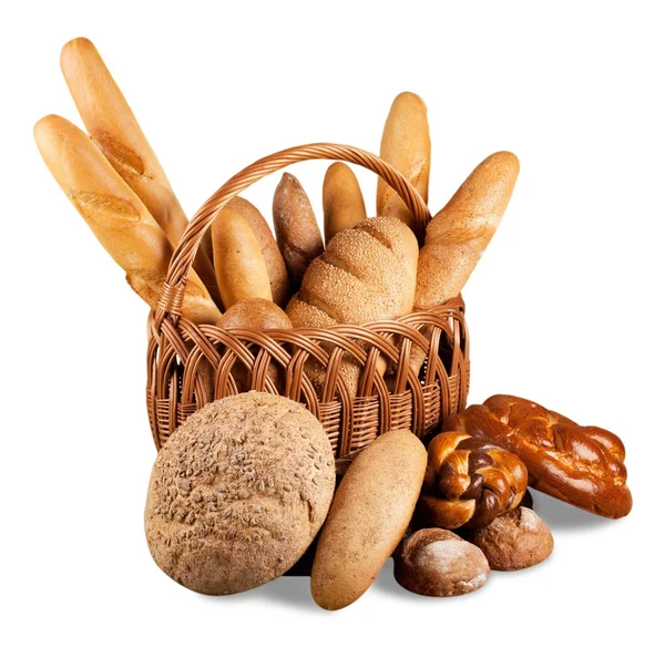 Kompozycja z chleba w wiklinowym koszu — Zdjęcie stockowe