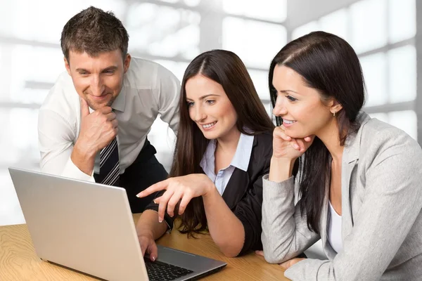 Business people using laptop — Stock Photo, Image