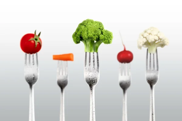 Vegetables on the collection of forks — Stock Photo, Image