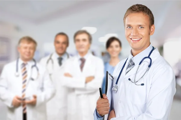 Team of doctors in uniform standing — Stock Photo, Image