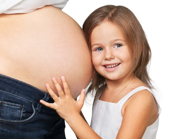Beautiful pregnant woman with her daughter — Stock Photo, Image