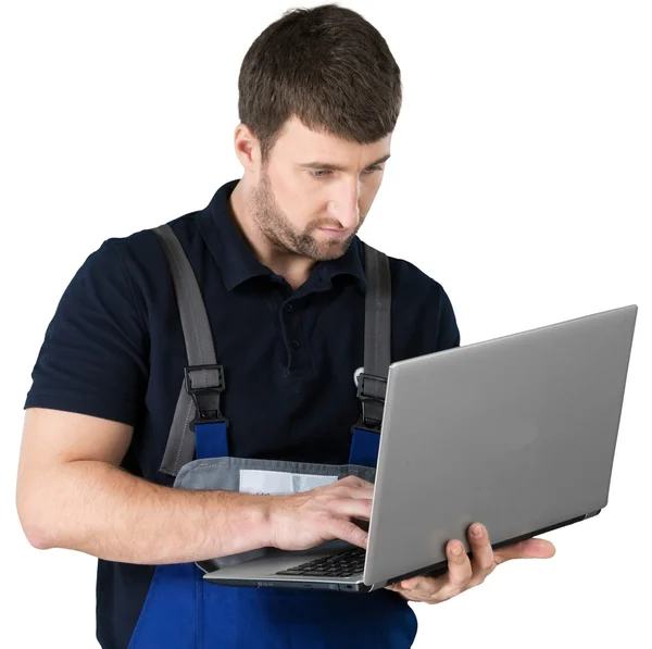 Portret van gelukkig reparateur met laptop — Stockfoto