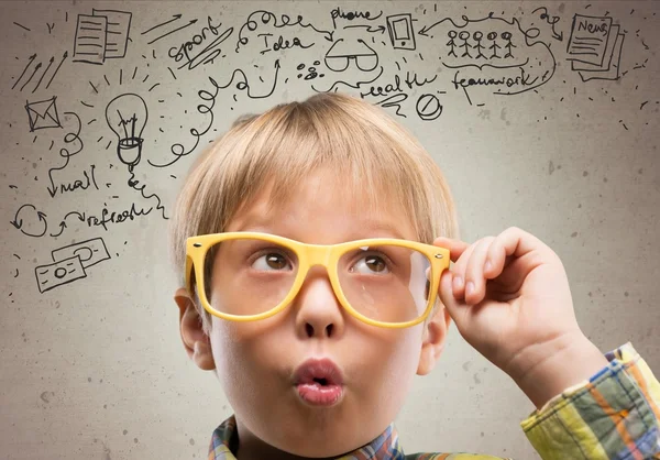 Cute young boy with glasses Stock Image