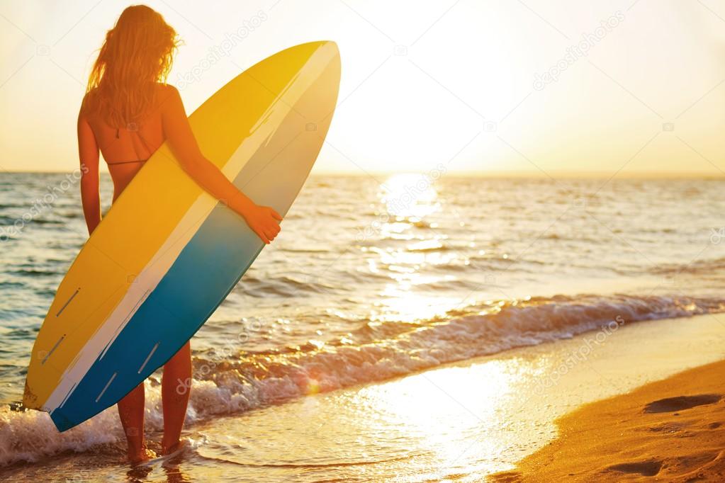 Beautiful female surfer  