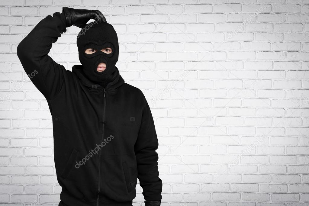 Thief in black balaclava 