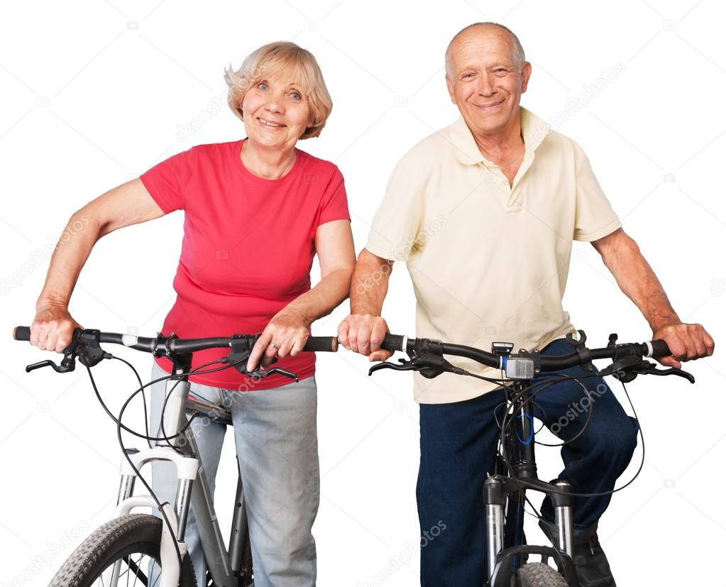 senior couple  riding bikes