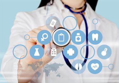 Tıbbi simge ve genç doktor 