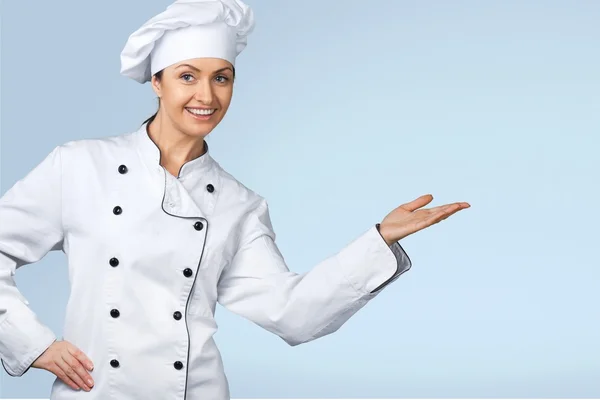 Portrét mladé ženy šéfkuchaře — Stock fotografie