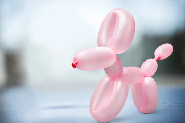 Palloncino rosa in forma di cane — Foto Stock