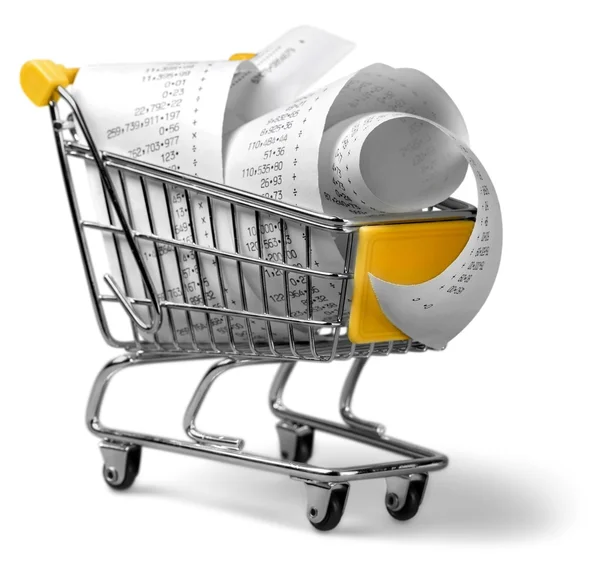 Shopping cart full with bills — Stock Photo, Image