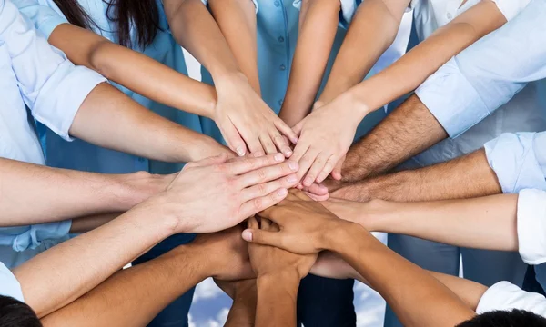 Handshake of many business people — Stock Photo, Image