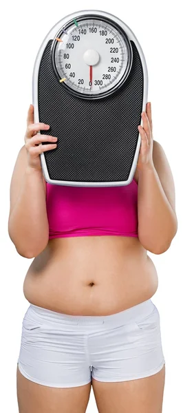Barriga feminina gorda e escala — Fotografia de Stock