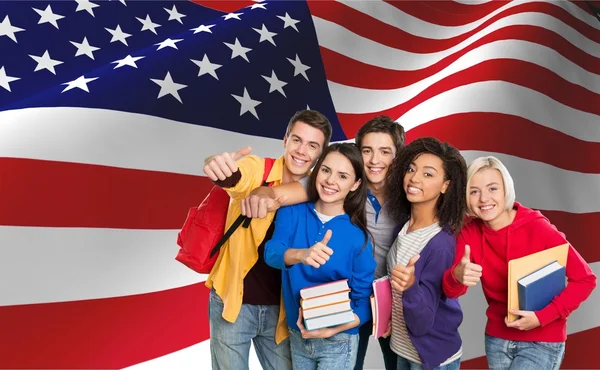 Group of students with books