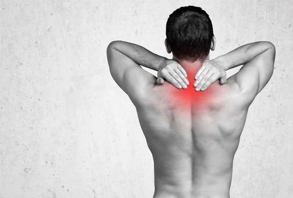 Strong man with neck pain — Stock Photo, Image