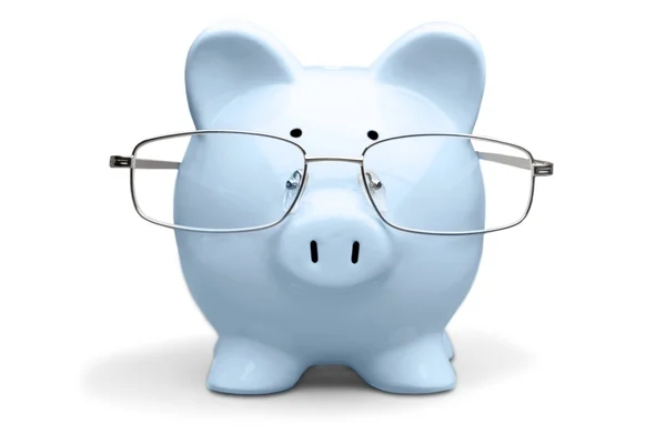 Piggy bank in glasses — Stock Photo, Image