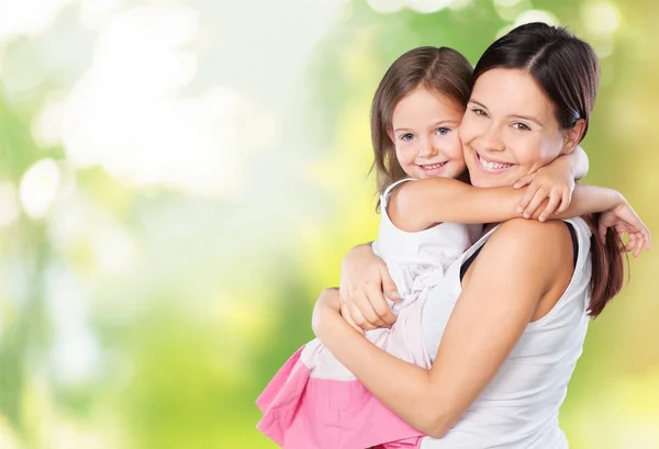 Mother and daughter hugging — Stock Photo, Image