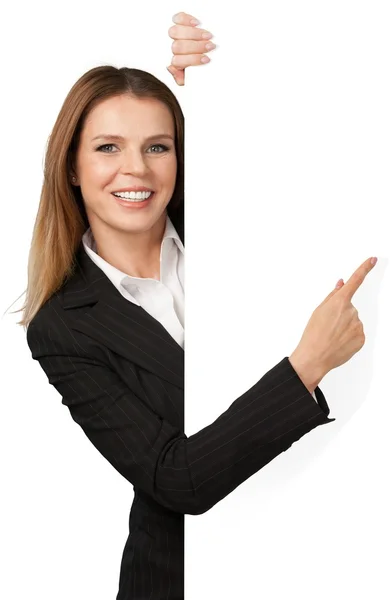 Молода бізнес-леді вказує пальцем — стокове фото