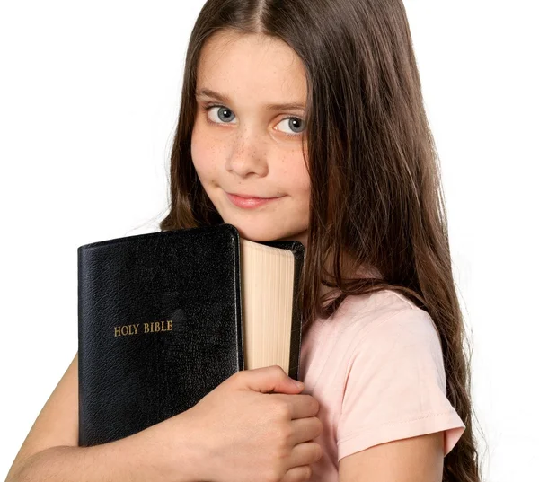 Menina segurando Bíblia — Fotografia de Stock