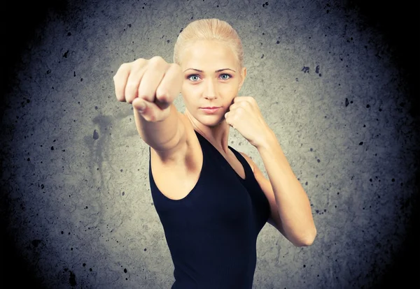 Beautiful blond woman boxing — Stock Photo, Image