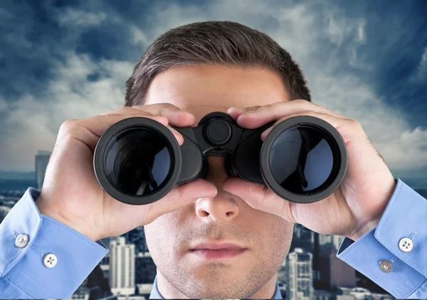 Man in shirt  with binoculars — Stock Photo, Image