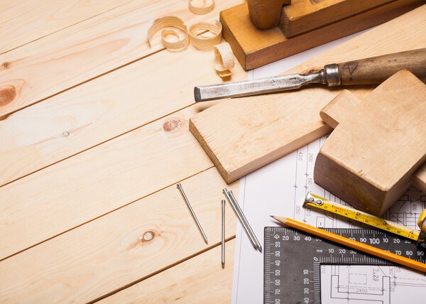 Carpentry tools with wooden planks