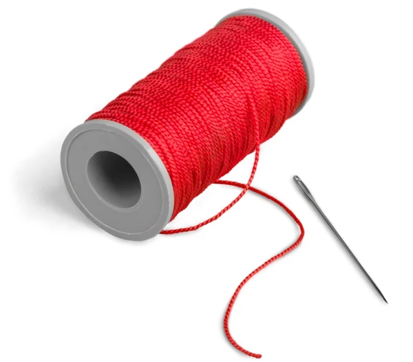 Bobbin of thread on  background Stock Picture