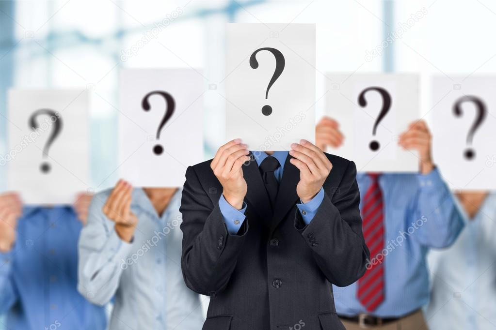 Business people with question marks
