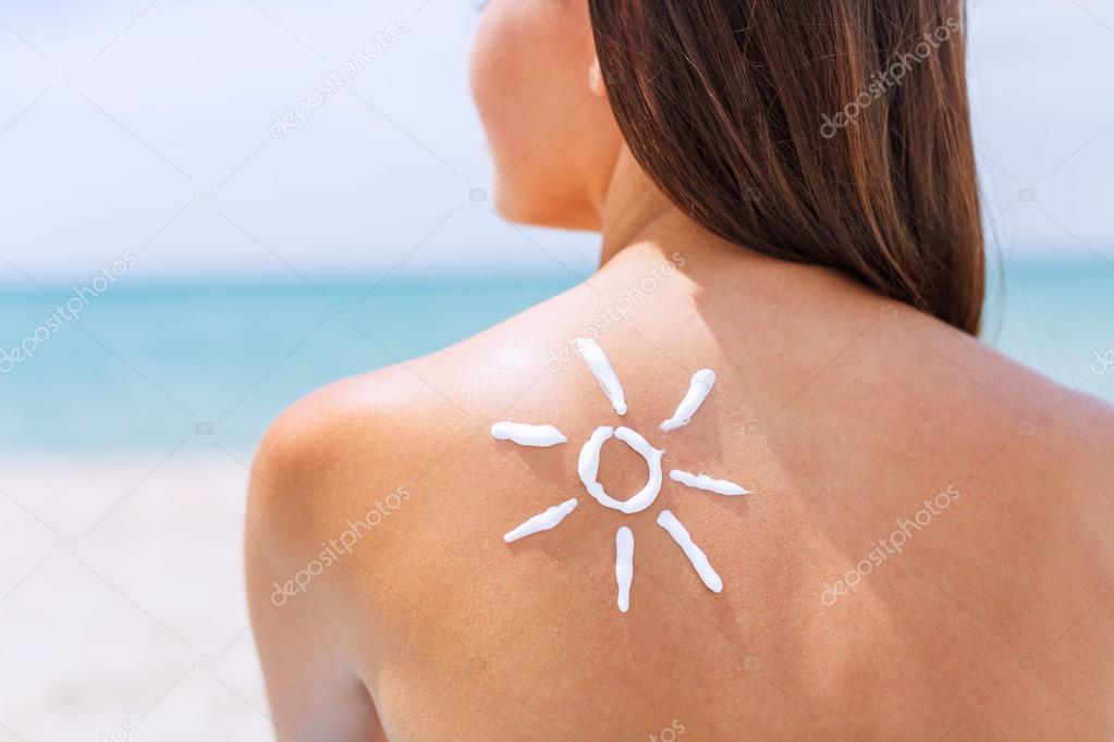 Woman with Sunscreen Solar Cream 