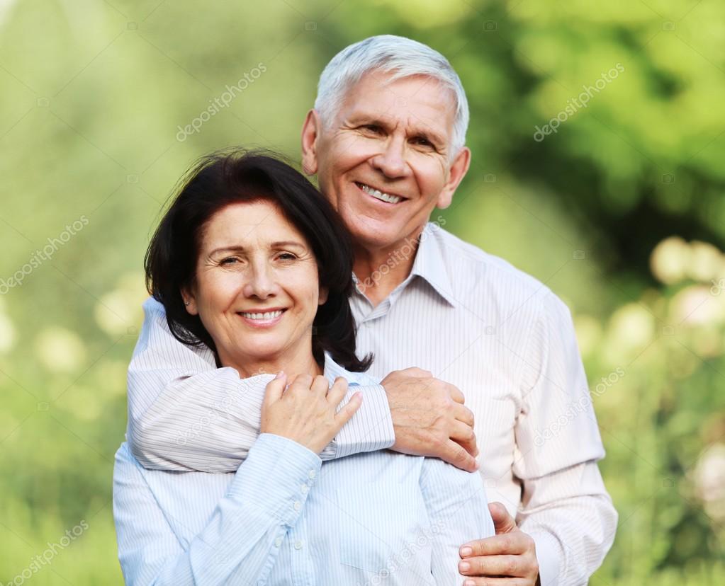 happy senior couple smiling 