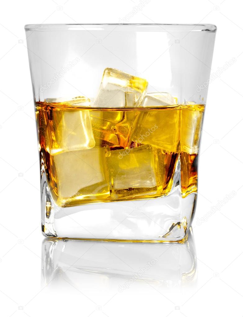 Glass of whiskey and ice isolated 