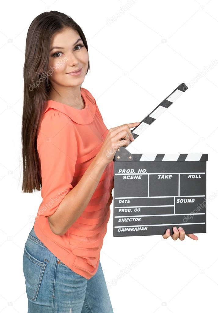  young woman with movie clapper