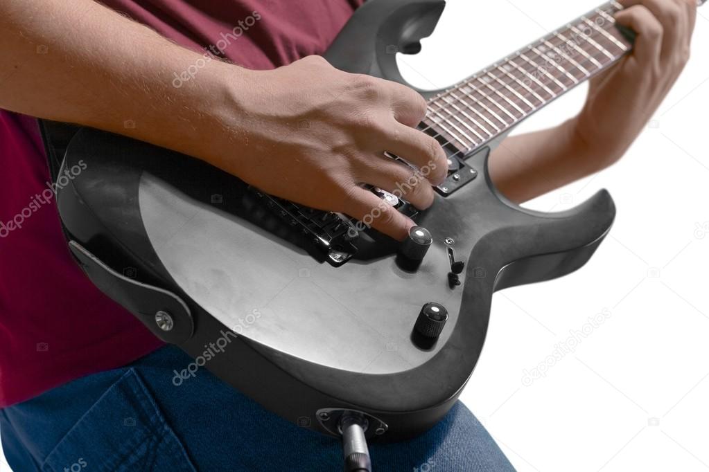 guitarist plays on the electric guitar 