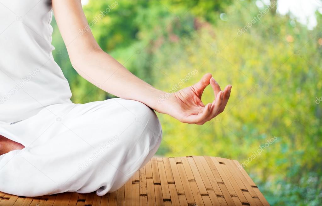 calm woman doing yoga exercise