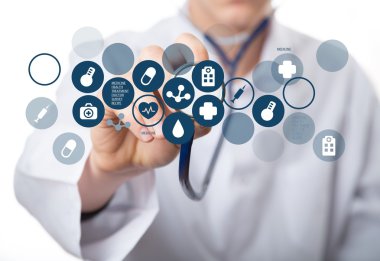 Tıbbi simge ve genç doktor 