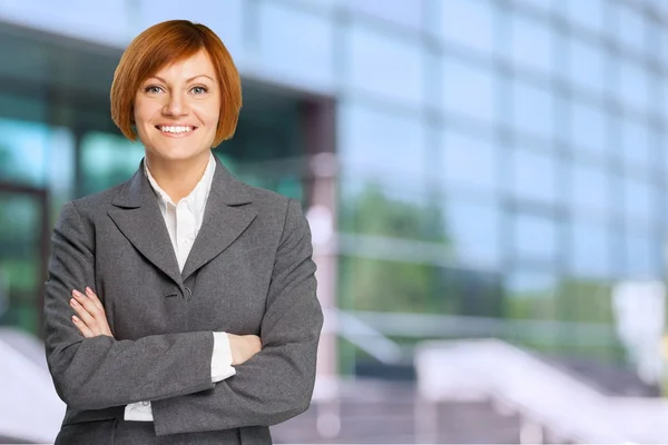 Cheerful businesswoman standing — Stock Photo, Image