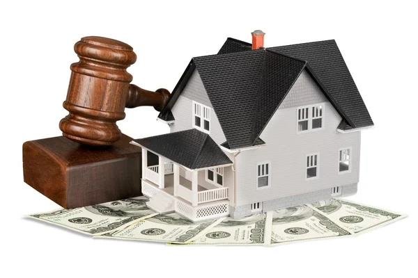Wooden judge gavel and toy  house — Stock Photo, Image