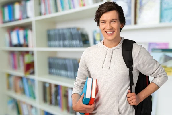 Männlicher Student mit Rucksack — Stockfoto