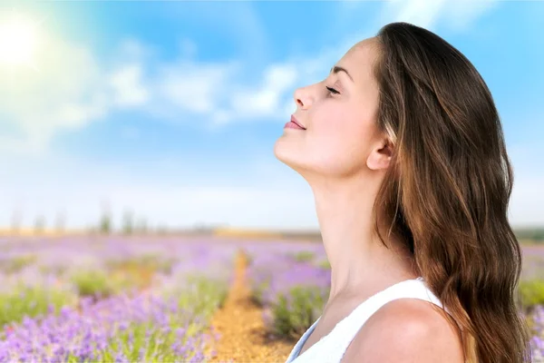 Woman  on natural background — Stock Photo, Image