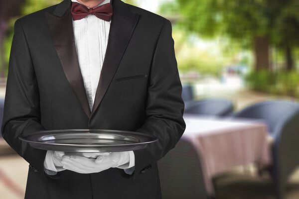 waiter hand  holding an empty plate