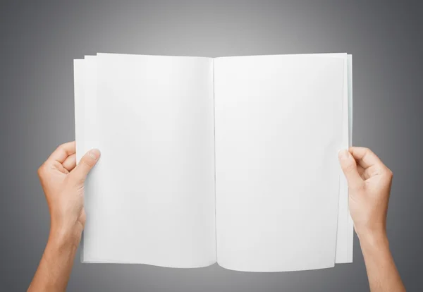 Mãos segurando livro em branco — Fotografia de Stock