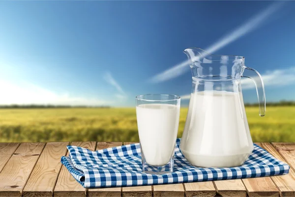 Glass of milk and bottle — Stock Photo, Image