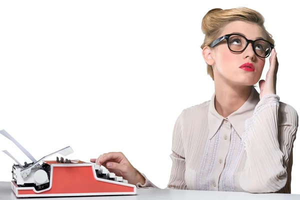 Woman working on vintage typewriter — Stock Photo, Image
