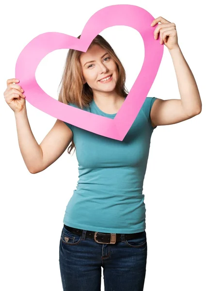 Krásná dívka drží symbol srdce — Stock fotografie