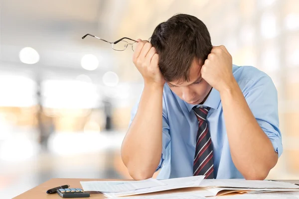 Businessman with many business papers — Stock Photo, Image